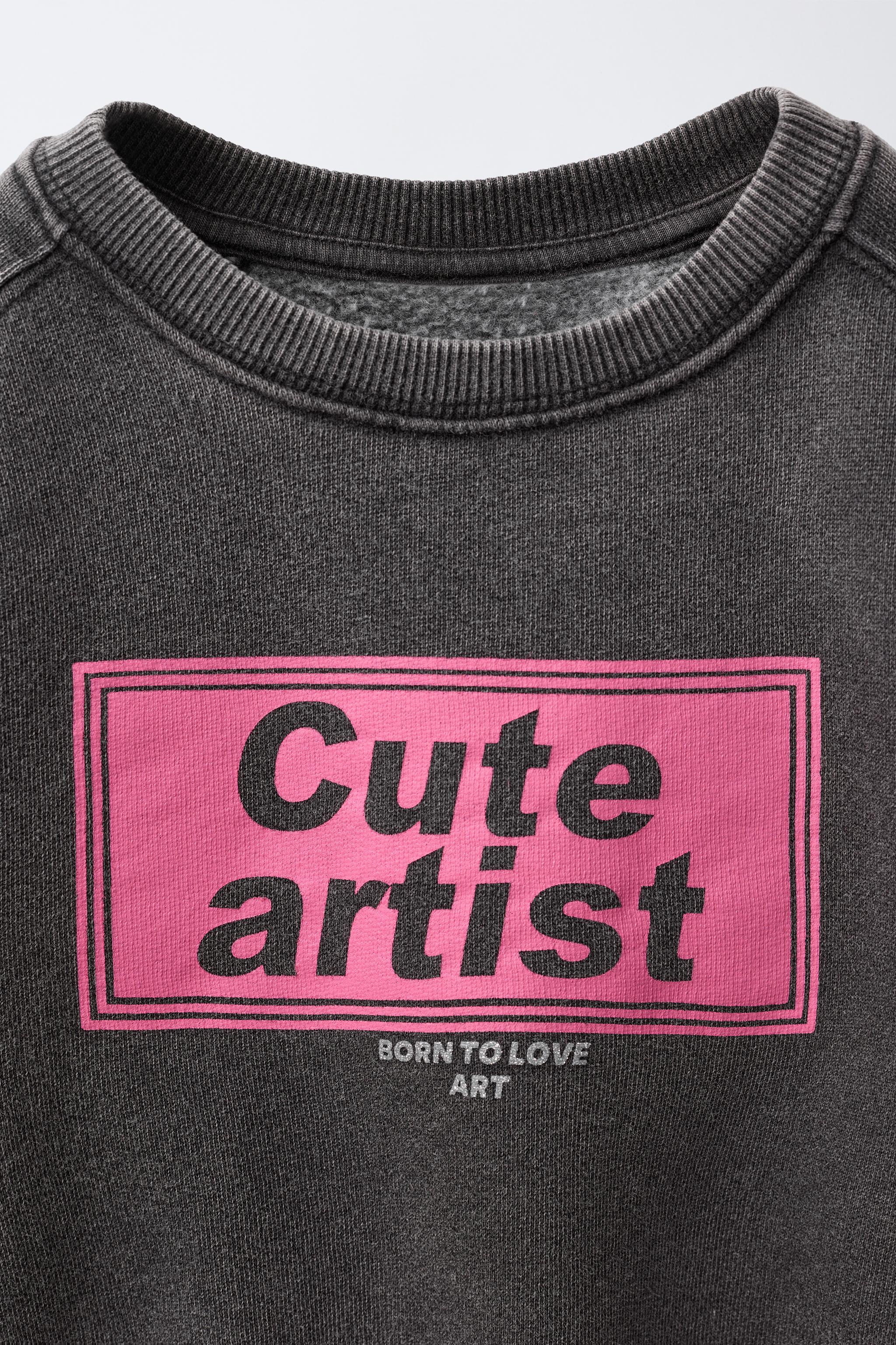 WASHED EFFECT PRINTED SWEATSHIRT